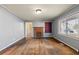Living room with hardwood floors, fireplace and window at 12205 Highway 36, Covington, GA 30014