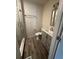 Modern bathroom with gray vanity and glass shower at 1902 E Piedmont Rd, Marietta, GA 30062