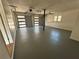 Spacious two-car garage with a freshly painted floor at 1902 E Piedmont Rd, Marietta, GA 30062