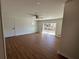 Spacious Gathering room with hardwood floors and sliding glass doors at 1902 E Piedmont Rd, Marietta, GA 30062