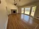 Hardwood floors and a large bay window brighten this living room at 1902 E Piedmont Rd, Marietta, GA 30062