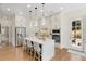 Modern eat-in kitchen with stainless steel appliances, white cabinets, and large center island with seating at 204 Dawson Dr, Woodstock, GA 30188