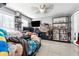 Bedroom with tiled floors, ceiling fan, and lots of storage at 24 Planters Sw Dr, Lilburn, GA 30047