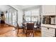 Breakfast nook in kitchen with wood floors at 24 Planters Sw Dr, Lilburn, GA 30047