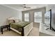 Bedroom with two windows and a wooden ceiling fan at 221 Kenninghall Se Ln, Smyrna, GA 30082