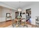 Open-concept dining area flows seamlessly into the entryway and kitchen at 221 Kenninghall Se Ln, Smyrna, GA 30082