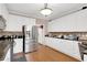 Kitchen with stainless steel appliances and white cabinetry at 2265 Wildwood Lake Dr, Suwanee, GA 30024