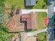 Aerial view of a ranch house with a large backyard and surrounding trees at 2815 Spain Dr, East Point, GA 30344