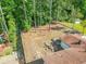 Aerial view of a house's backyard, showing a large, mostly unlandscaped area at 2815 Spain Dr, East Point, GA 30344