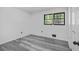 Well-lit bedroom featuring gray flooring and windows at 2815 Spain Dr, East Point, GA 30344