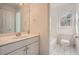 Clean bathroom with a vanity, toilet and bathtub at 3422 Sweetbriar Ln, Powder Springs, GA 30127