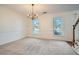 Formal dining room with chandelier and neutral decor at 3422 Sweetbriar Ln, Powder Springs, GA 30127