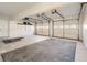 Large garage with two doors and flooring at 3422 Sweetbriar Ln, Powder Springs, GA 30127