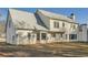 Rear view of a two-story house with yard at 3422 Sweetbriar Ln, Powder Springs, GA 30127