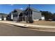 Two-story house with gray siding, white trim, and a large yard at 512 Dolce Rd, Locust Grove, GA 30248