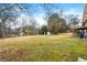 Large backyard with shed and mature trees at 64 Valley Hill Sw Rd, Riverdale, GA 30274