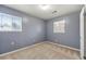 Simple bedroom with neutral walls and carpet flooring at 64 Valley Hill Sw Rd, Riverdale, GA 30274