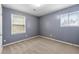 Simple bedroom with neutral walls and carpet flooring at 64 Valley Hill Sw Rd, Riverdale, GA 30274