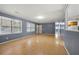 Bright living room with hardwood floors and gray walls at 64 Valley Hill Sw Rd, Riverdale, GA 30274