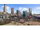 Aerial view of downtown skyline with park and Ferris wheel at 250 Park W Ave # 701, Atlanta, GA 30313