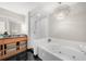 Spa-like bathroom with a soaking tub and a walk-in shower at 250 Park W Ave # 701, Atlanta, GA 30313