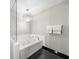 Relaxing bathroom with a large jetted tub and shower at 250 Park W Ave # 701, Atlanta, GA 30313