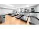 Modern gym featuring treadmills, ellipticals, and strength training equipment at 250 Park W Ave # 701, Atlanta, GA 30313