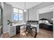 Home office with a large desk and window offering city views at 250 Park W Ave # 701, Atlanta, GA 30313