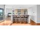 Modern kitchen with stainless steel appliances and an island with seating at 250 Park W Ave # 701, Atlanta, GA 30313