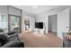 Spacious living room with access to a balcony and city views at 250 Park W Ave # 701, Atlanta, GA 30313