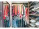 Spacious walk-in closet with ample hanging space and shelving at 250 Park W Ave # 701, Atlanta, GA 30313