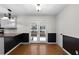 Bright dining room with hardwood floors and french doors leading to patio at 26 Buena Vista Se Cir, Cartersville, GA 30121