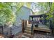 Spacious deck with pergola, hot tub, and ample seating for outdoor entertaining at 2339 Milstead Cir, Marietta, GA 30066