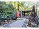 Cozy patio area with seating, a grill, and a relaxing atmosphere at 2339 Milstead Cir, Marietta, GA 30066