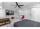 Finished basement bedroom with large TV, comfortable seating, and ensuite bathroom access at 2339 Milstead Cir, Marietta, GA 30066