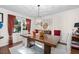 Formal dining room with hardwood floors, a large table and chandelier at 2339 Milstead Cir, Marietta, GA 30066