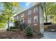 Brick two-story house with landscaping and a welcoming front porch at 2339 Milstead Cir, Marietta, GA 30066