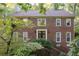 Brick two-story house with double doors and landscaping at 2339 Milstead Cir, Marietta, GA 30066