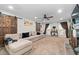 Spacious living room with vaulted ceiling, large sectional sofa and barn doors at 2339 Milstead Cir, Marietta, GA 30066