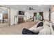 Bright living room with fireplace, hardwood floors, and french doors at 2339 Milstead Cir, Marietta, GA 30066