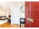 Inviting foyer with hardwood floors and a glimpse into the stylish living room at 15 Kings Tavern Nw Pl, Atlanta, GA 30318