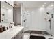 Stylish bathroom featuring a glass enclosed shower, modern vanity, and sleek fixtures at 33 Ponce De Leon Ne Ave # 203, Atlanta, GA 30308