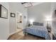 Bright bedroom features hardwood floors, modern decor, and ensuite bathroom at 33 Ponce De Leon Ne Ave # 203, Atlanta, GA 30308