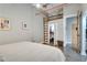 Cozy bedroom featuring white walls and ladder, offering a closet, ceiling fan and overhead ductwork at 33 Ponce De Leon Ne Ave # 203, Atlanta, GA 30308