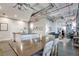 Open concept living space with a dining area, kitchen, and industrial-chic design at 33 Ponce De Leon Ne Ave # 203, Atlanta, GA 30308