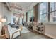 Inviting open-concept living space featuring high ceilings, large windows, and contemporary decor at 33 Ponce De Leon Ne Ave # 203, Atlanta, GA 30308