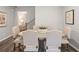 Casual dining area with an oval wooden table and six light beige chairs at 5595 Hislop Ln # 77, Mableton, GA 30126