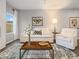 Light-filled living room with comfy sofas, a coffee table, and large windows at 5595 Hislop Lane # 77, Mableton, GA 30126