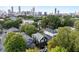 Aerial view showcasing the house and the cityscape in the background at 66 Howell Ne St, Atlanta, GA 30312