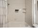 Simple bathroom with white subway tile and a shower/tub combo at 66 Howell Ne St, Atlanta, GA 30312